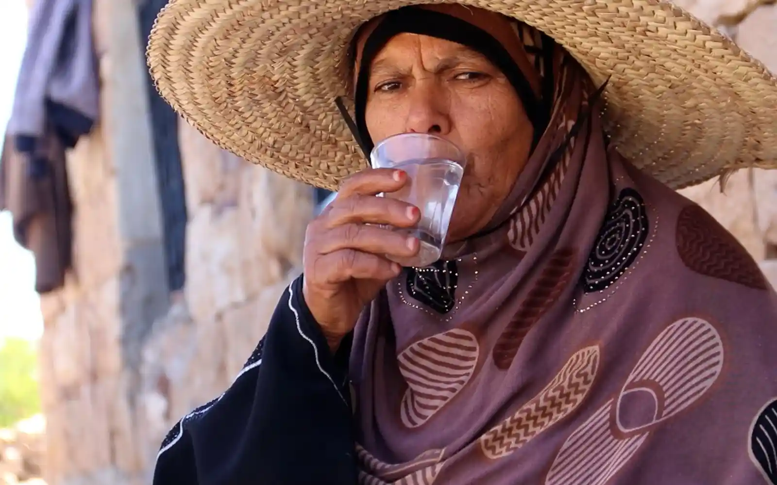 Samira, a resident of Taiz, Yemen enjoys clean water from her tap.