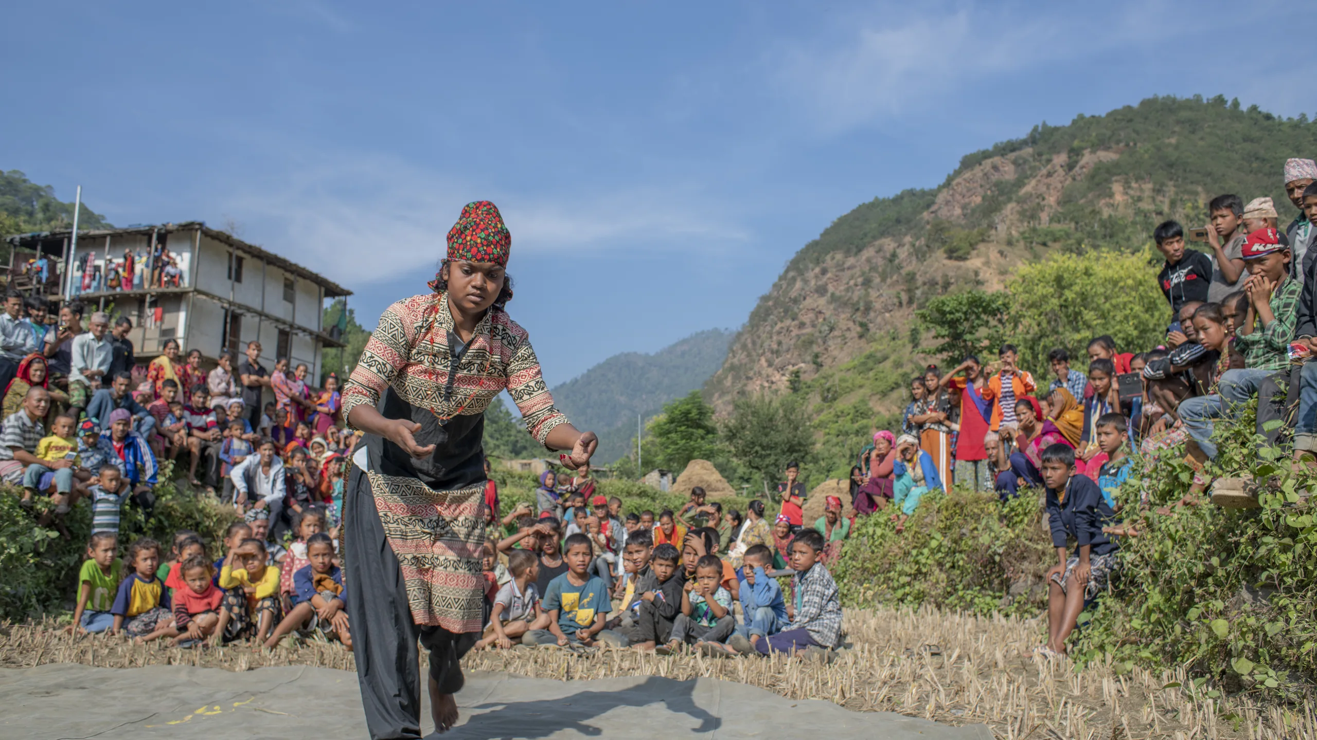 Actor performs to an audience in Morka, Jajarkot.