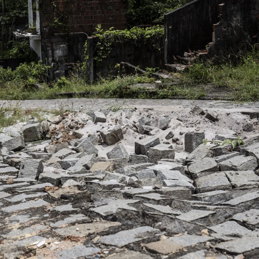 A sinking street in one of the disaster zones