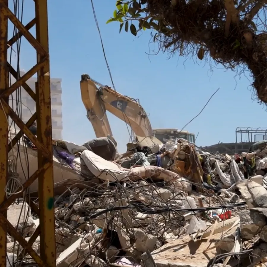 Rubble removal operations take place in South Lebanon with equipment supplied by UNOPS.
