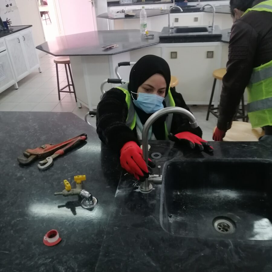 Plumbing works are completed at a secondary school in Mafraq.