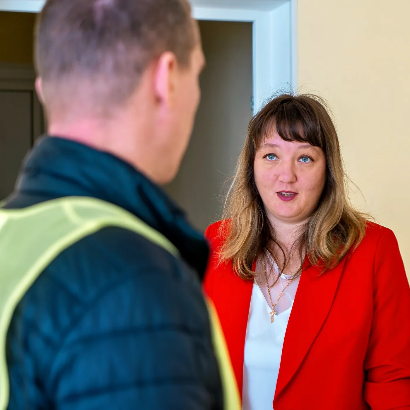 Oksana Petruk, Head of the Preschool Institution, discusses the ongoing restoration work with a project team member inside the renewed building