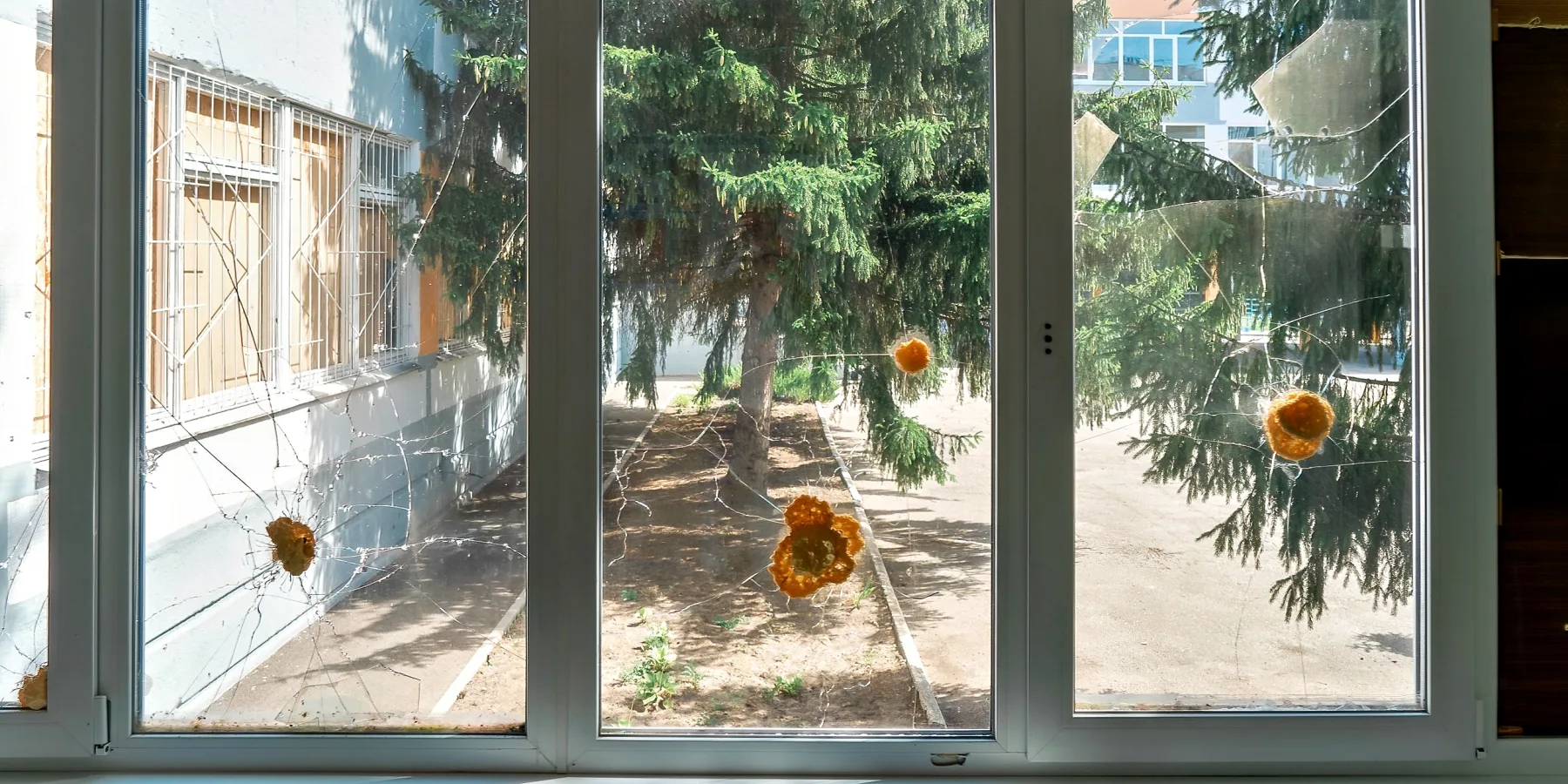 Many windows were shattered by fragments from shells that fell near the school.